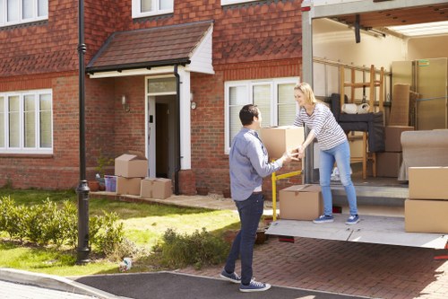 Professional packing materials and boxes prepared for a Millbank home move