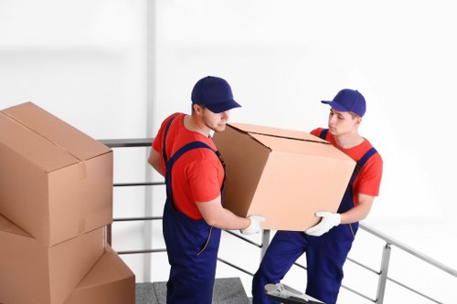 Removal team helping with a home move in Millbank