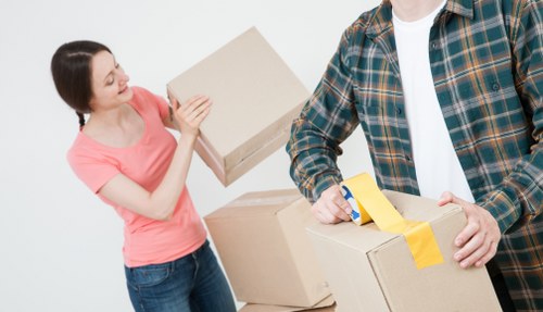 Team assessing manual handling risks during a house move