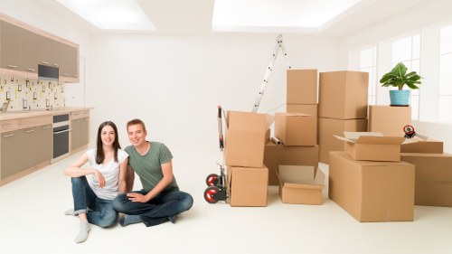 Professional movers handling an office relocation in Millbank