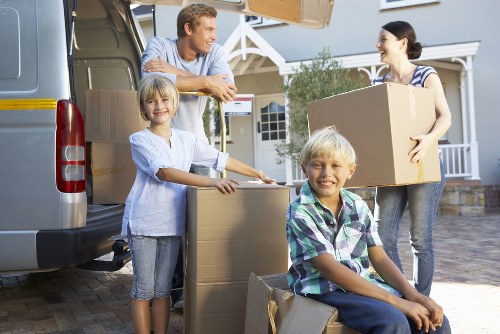 Moving crew reviewing safety measures before loading items