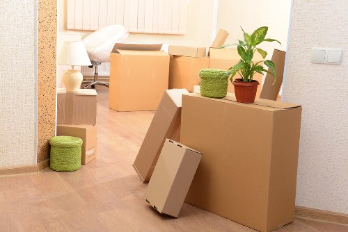 Office furniture and document boxes being transported in Millbank