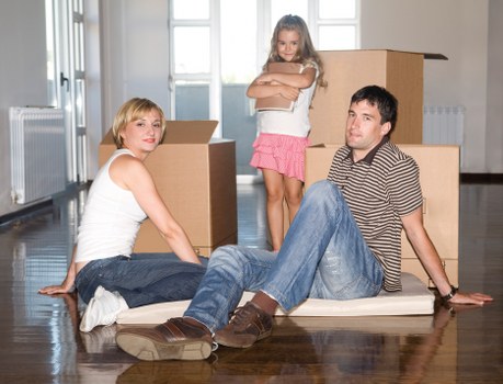 Packing and loading furniture into a removal truck